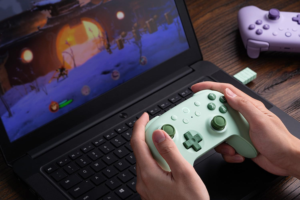 8Bitdo Ultimate 2C Wireless Controller for Windows PC and Android, with 1000 Hz Polling Rate, Hall Effect Joysticks and Triggers, and Remappable L4/R4 Bumpers (Transparent Black)