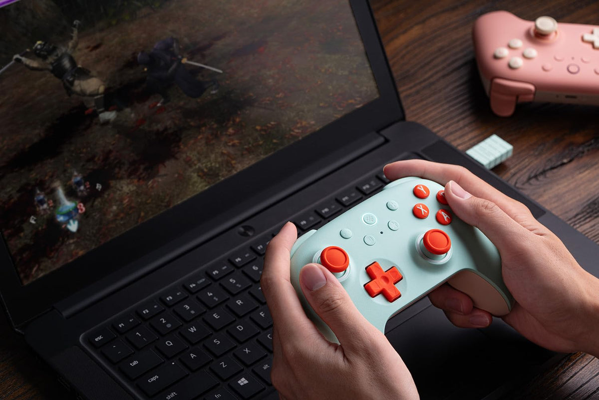 8Bitdo Ultimate 2C Wireless Controller for Windows PC and Android, with 1000 Hz Polling Rate, Hall Effect Joysticks and Triggers, and Remappable L4/R4 Bumpers (Transparent Black)